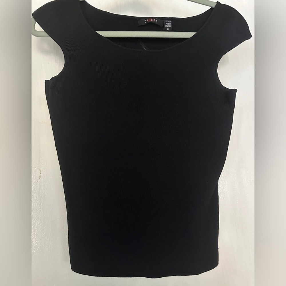 Chic Black Sleeveless Top with White Floral Accent